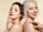 Two beautiful different age woman with perfect skin headshot portrait. Senior lady and young girl in underwear standing back-to-back posing for camera. Spa beauty salon procedure and home skincare